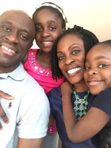 Dr. Olawoye with his wife and two daughters